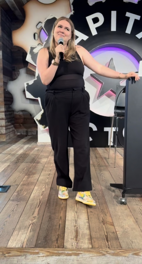 Bree speaking with a microphone